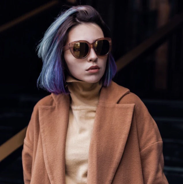 Photo of a girl with blue hair and coat before PicsArt edit