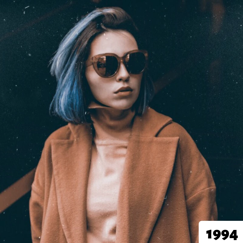 Portrait of a girl with sunglasses after 1994 filter