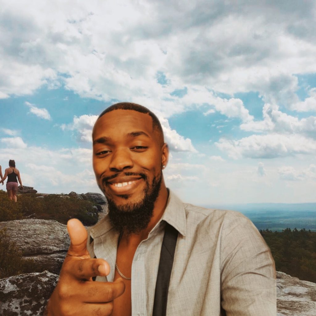 Young man takes selfie on a hike