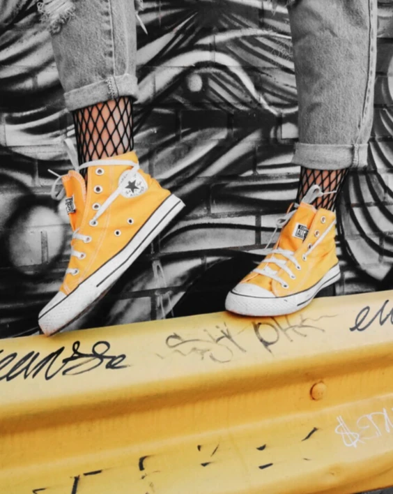 yellow sneakers with color splash effect