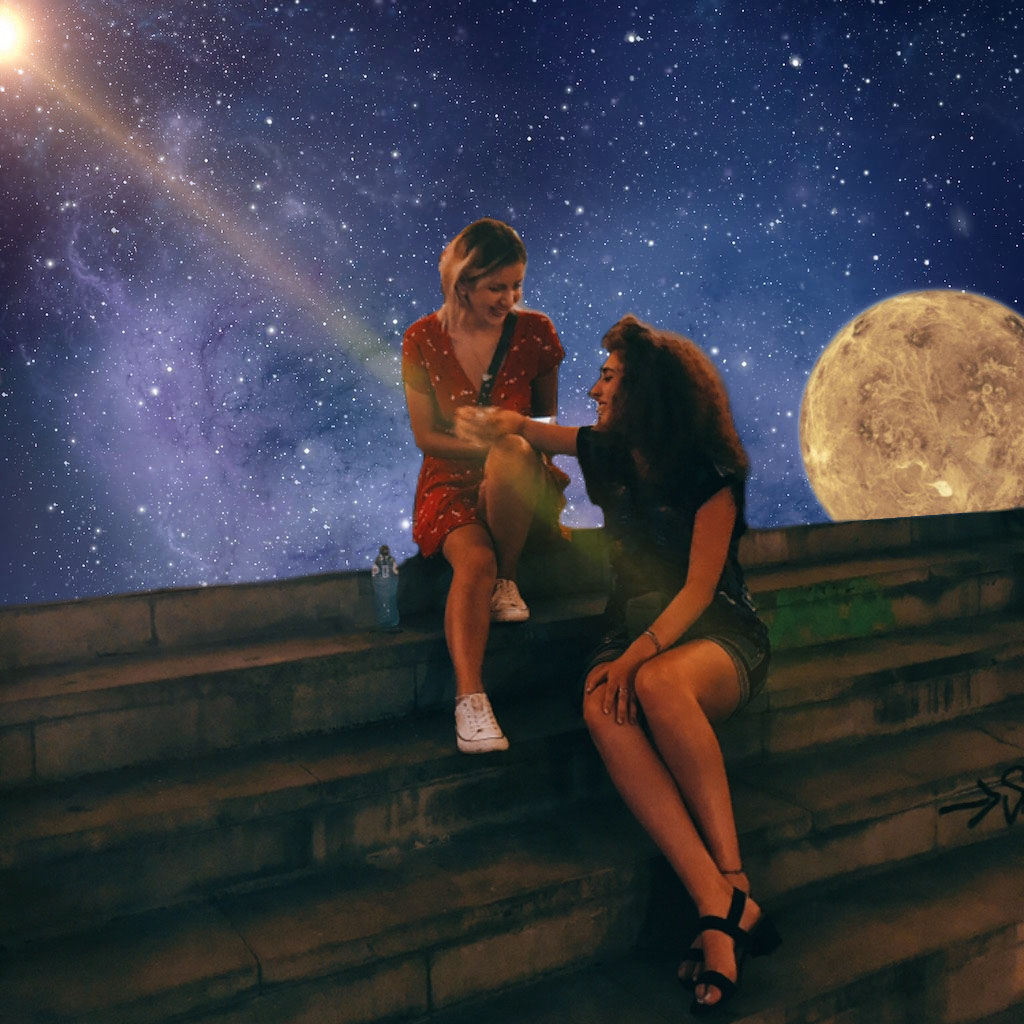 girls smiling talking in the night under the starry sky