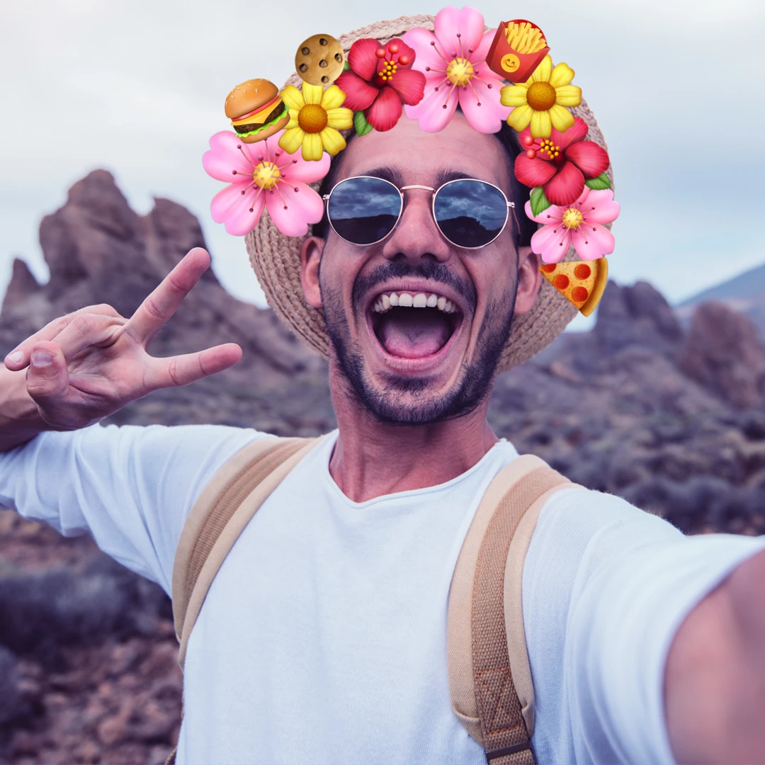 Guy wearing fast food emoji crown
