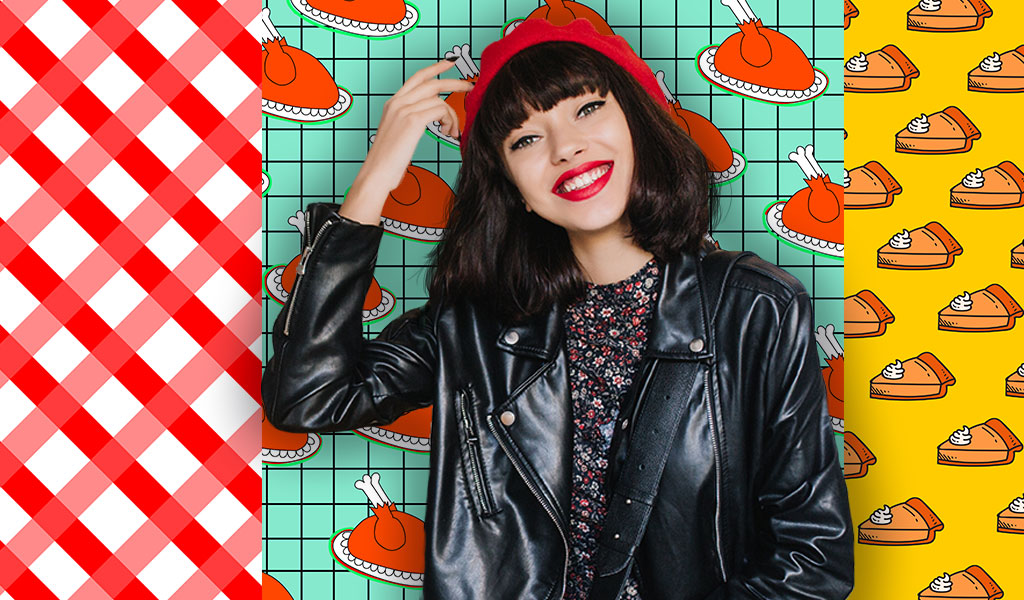 woman smiling in front of colorful wall