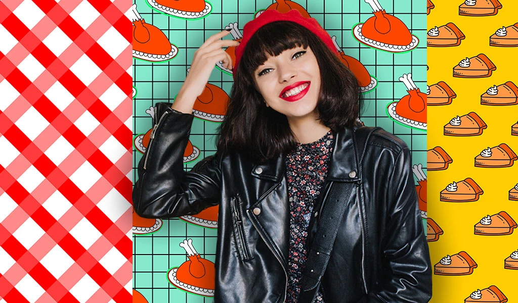 woman smiling in front of colorful wall