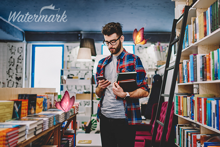 Watermark photo of a guy in a bookstore