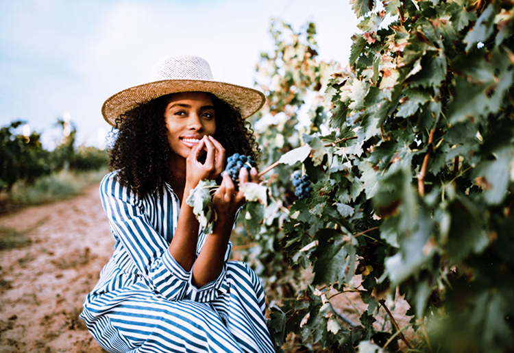 Film grain effect on girl with curly hair and hat