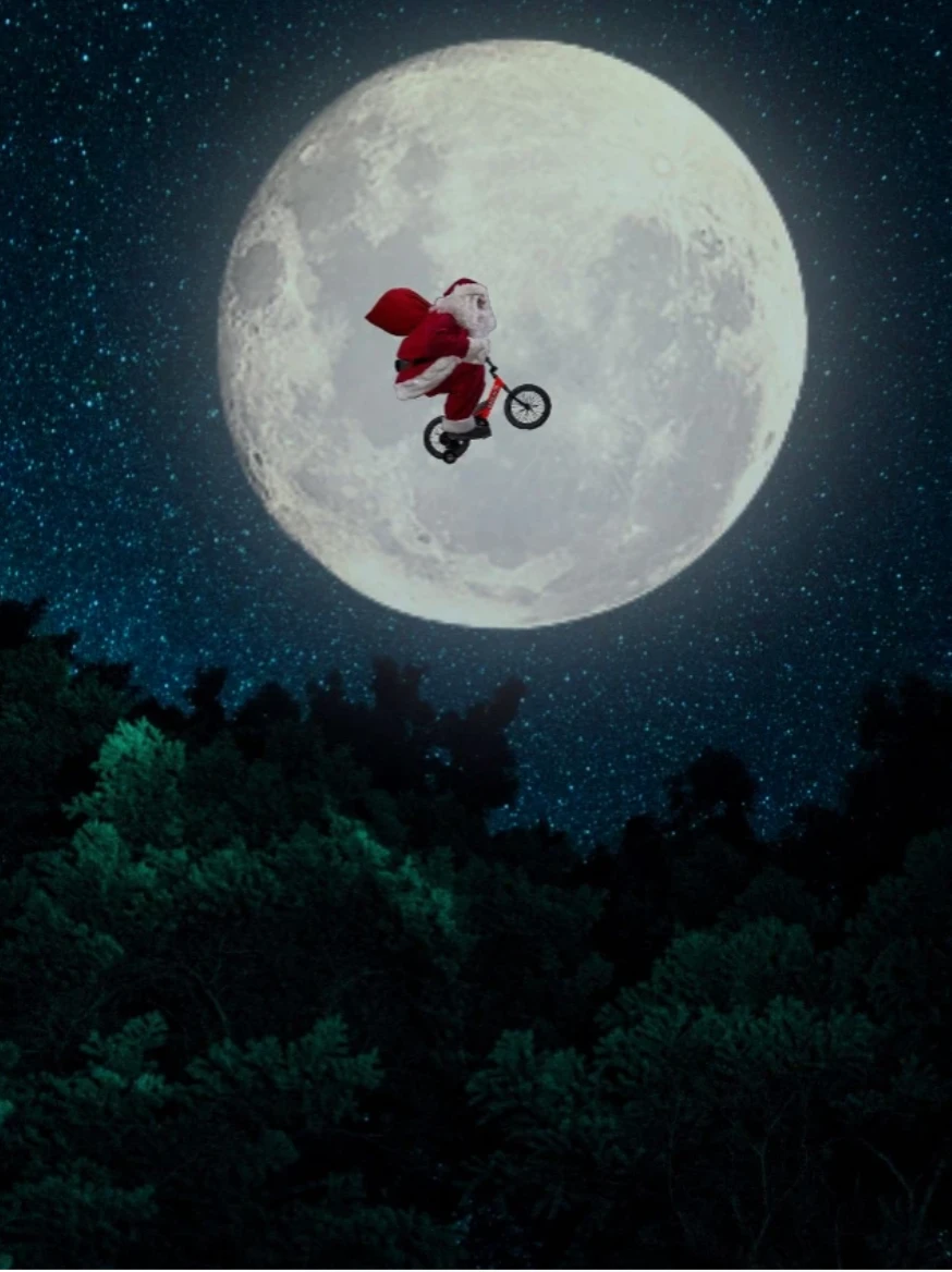 Santa Clause flying by moon