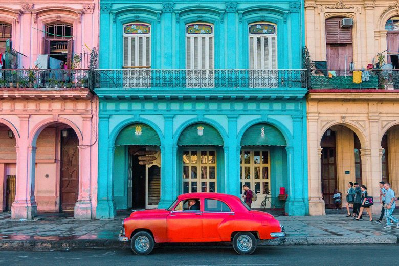 Colorful buildings and car