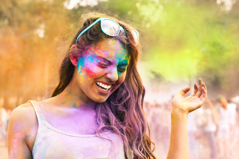 What is Holi, and why do people throw colored powder to  celebrate?HelloGiggles