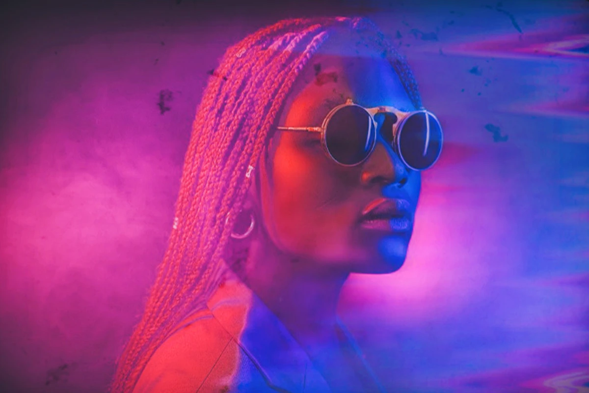 woman with a purple red and blue futuristic glitch effect