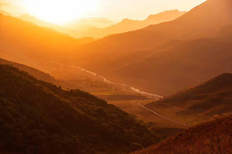 a valley at golden hour