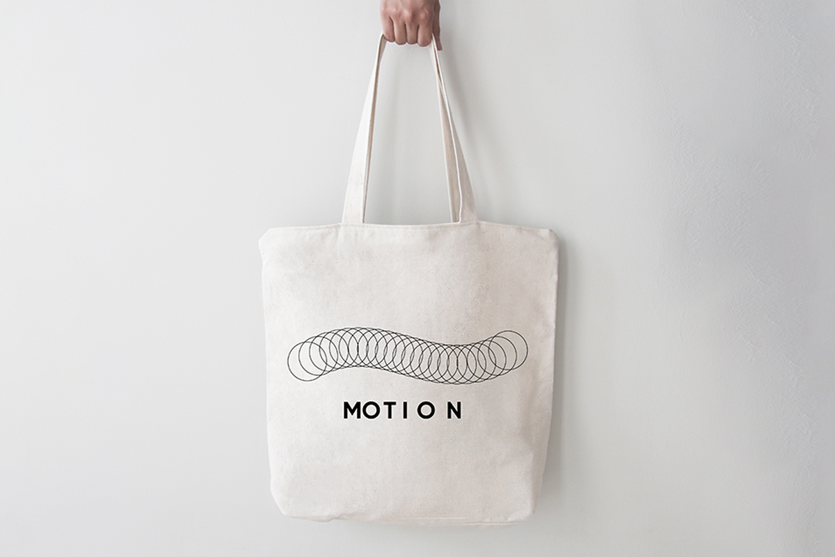 motion typography used to show branding elements on a tote bag