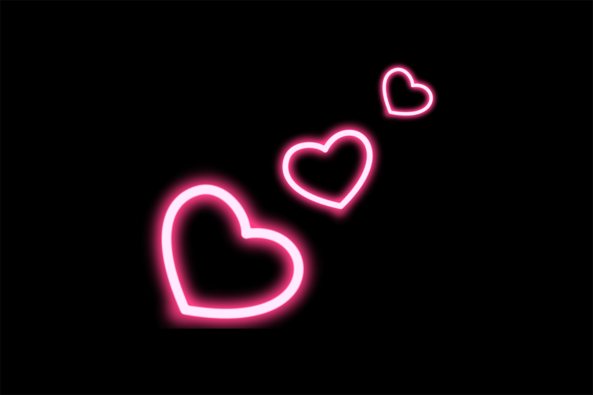 pink neon hearts on a black background