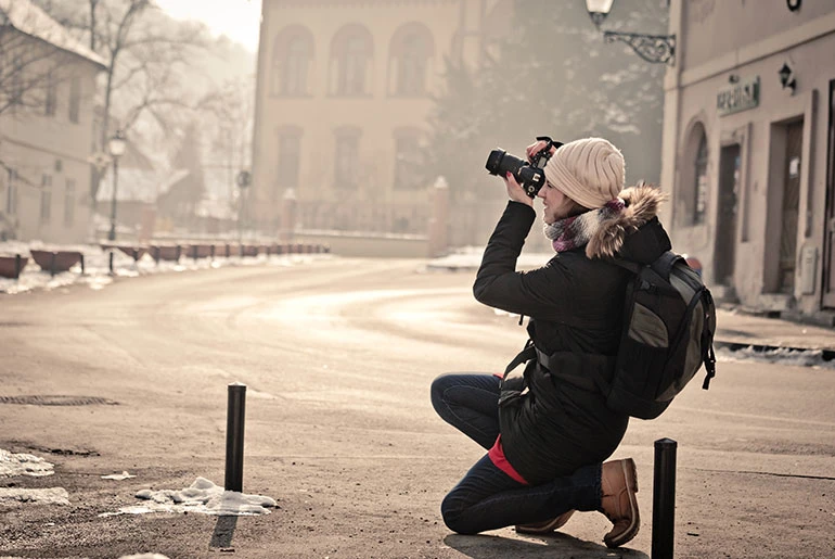 woman shooting street photography