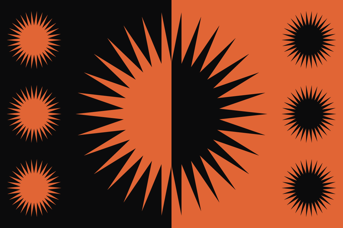 orange and black sun created with negative space