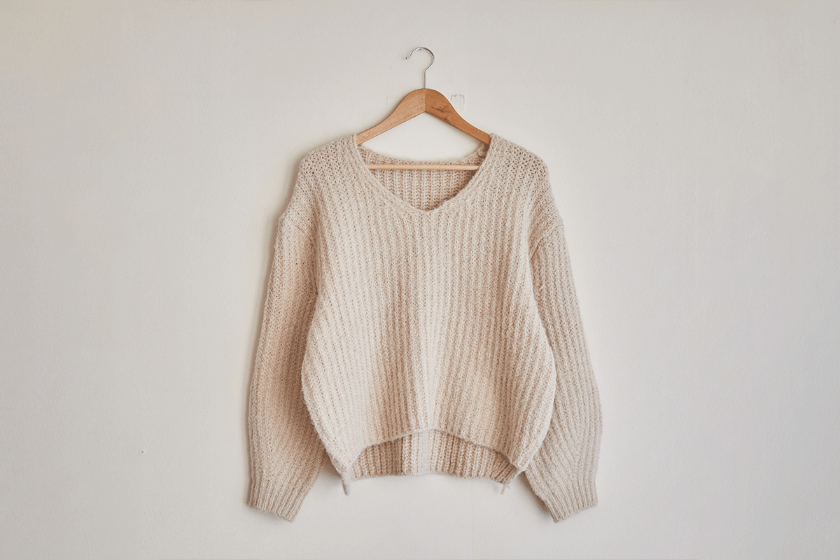 a vintage cream colored sweater