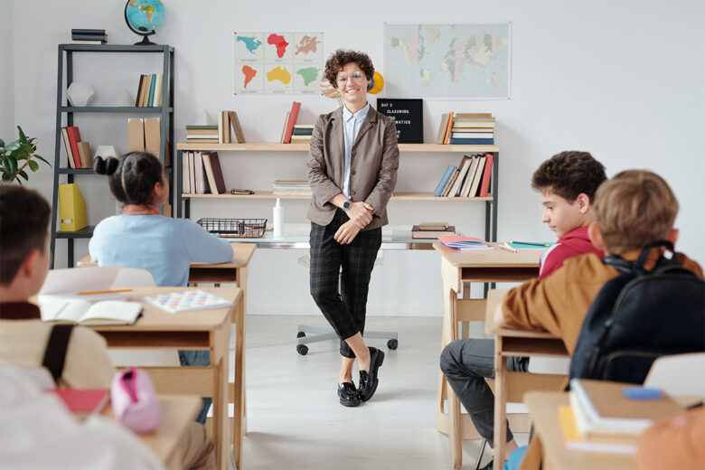 teacher standing in front of class