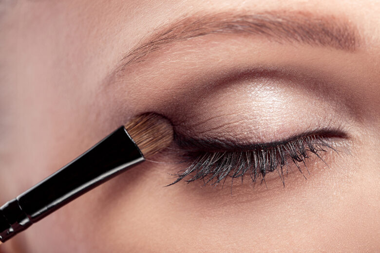 person applying smokey eye eyeshadow