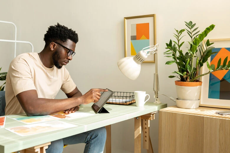 man working on tablet to view pdf report